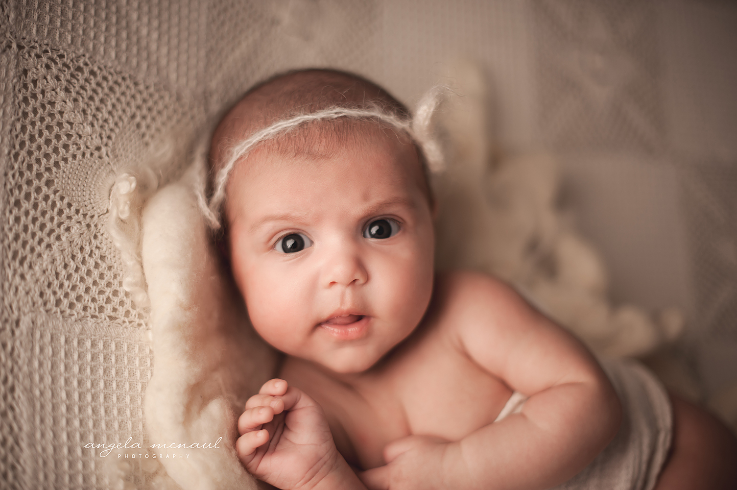 Charlottesville Baby Photographer photographing Newborn Ivey