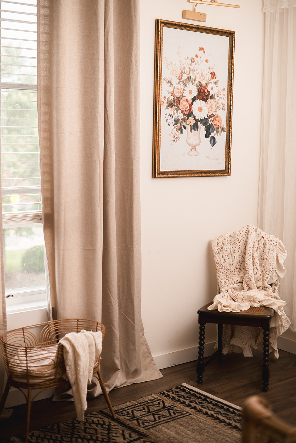 Client sitting area in Crozet newborn photo studio with cozy textures and natural window light