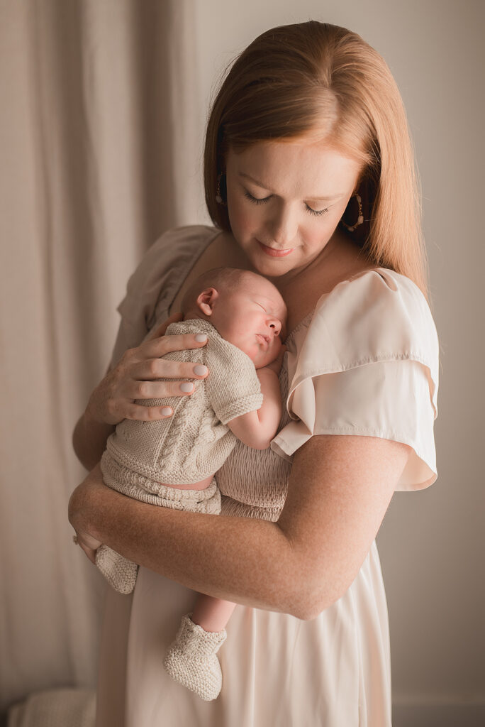 A quiet moment between mom and baby in my studio's natural light space
